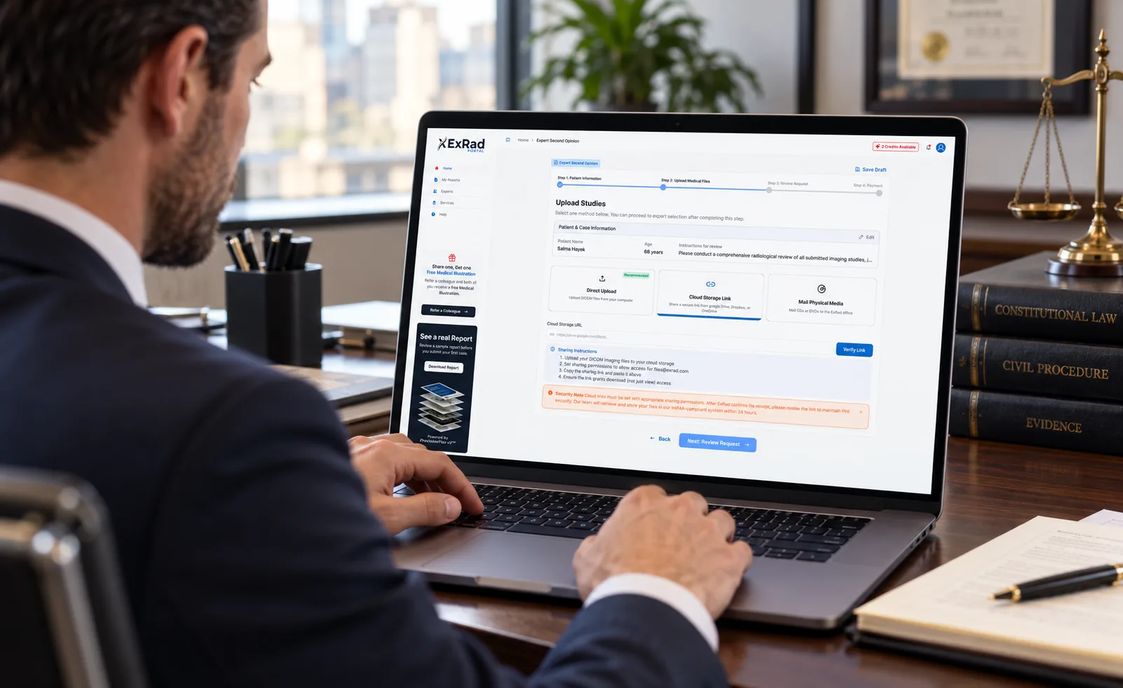 ExRad Portal interface viewed on a laptop in a legal office